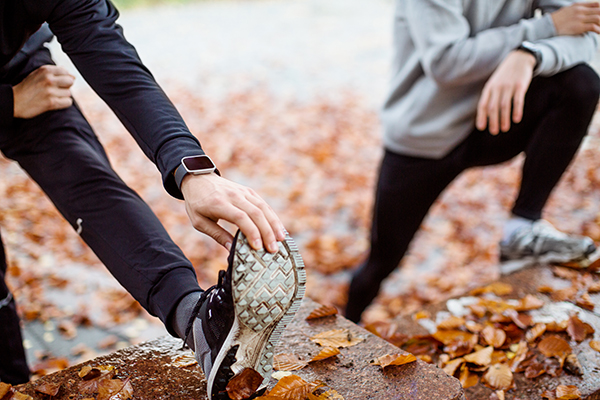 Two people going for a run in the Autumn